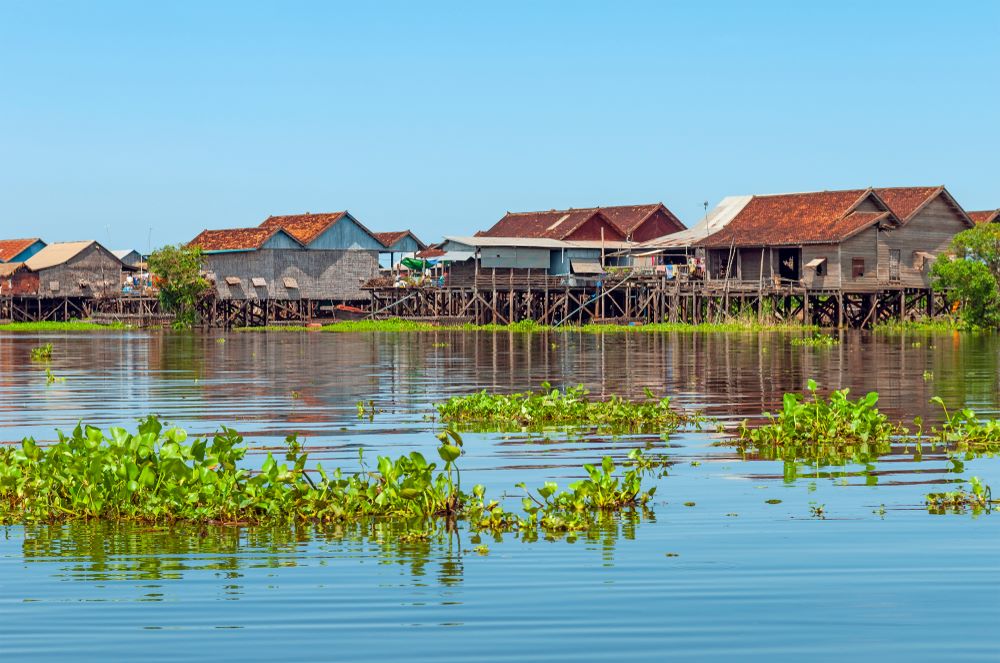 Colorful stilt houses in the floating village of Kompong Khleang by the Tonle Sap Lake