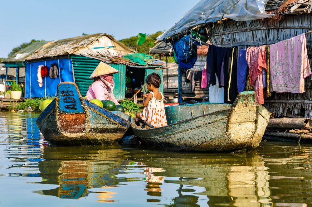 Local family in the floating village Kompong Khleang on the Tonle Sap Lake