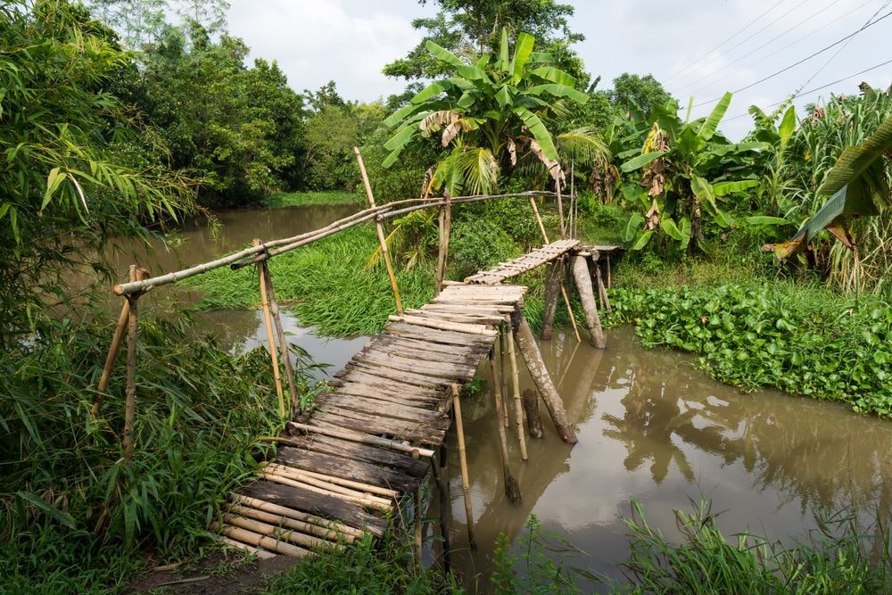 Wooden bridge over a canal of Can Tho, Vietnam