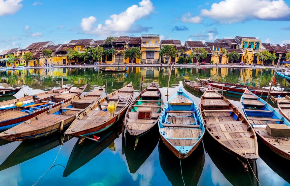 View of boats on busy river on Hoai River, Hoi An